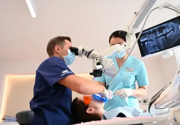 Endodontist dr. Ștefan Zgîmbău - Root canal treatment performed using microscope.